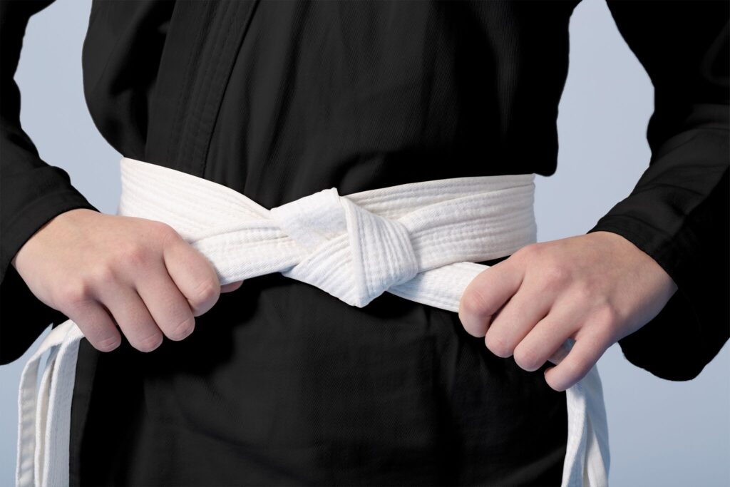 black suit white belt - 5 little things that can make a BIG difference