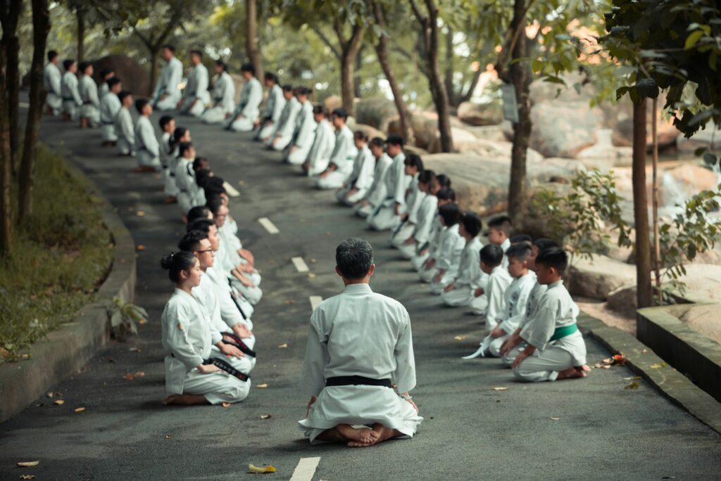 1ipv7slrz7w - How Martial Arts Schools Can Maximise Profit Without Compromising Quality people in white uniform walking on road during daytime