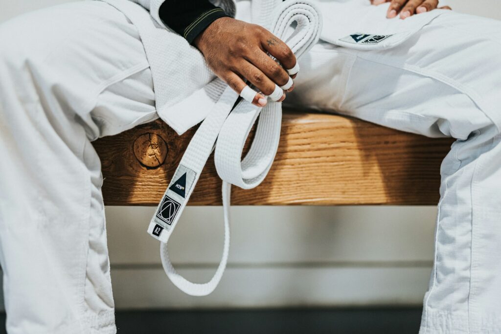 2akcsvckx0o - Marketing Martial Arts Camps: Templates, Tips, and Tools person in white dress shirt holding white plastic bag