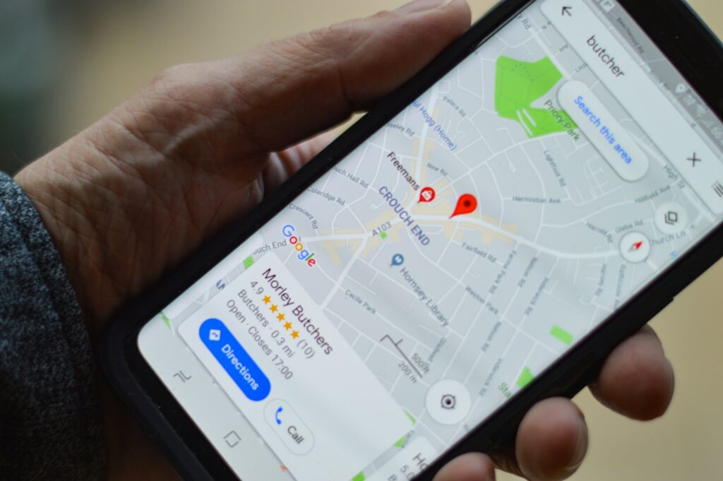 bjxaxq1l7di - Improve your local SEO person holding black smartphone