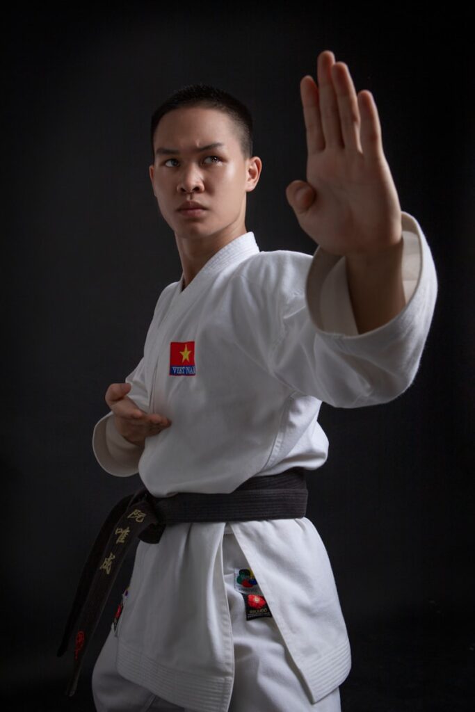 a man in a karate uniform