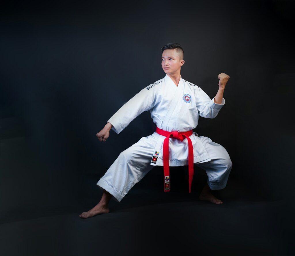 xs5c2amdslu - 5 Martial Arts Advertising Mistakes man standing wearing white karate gi