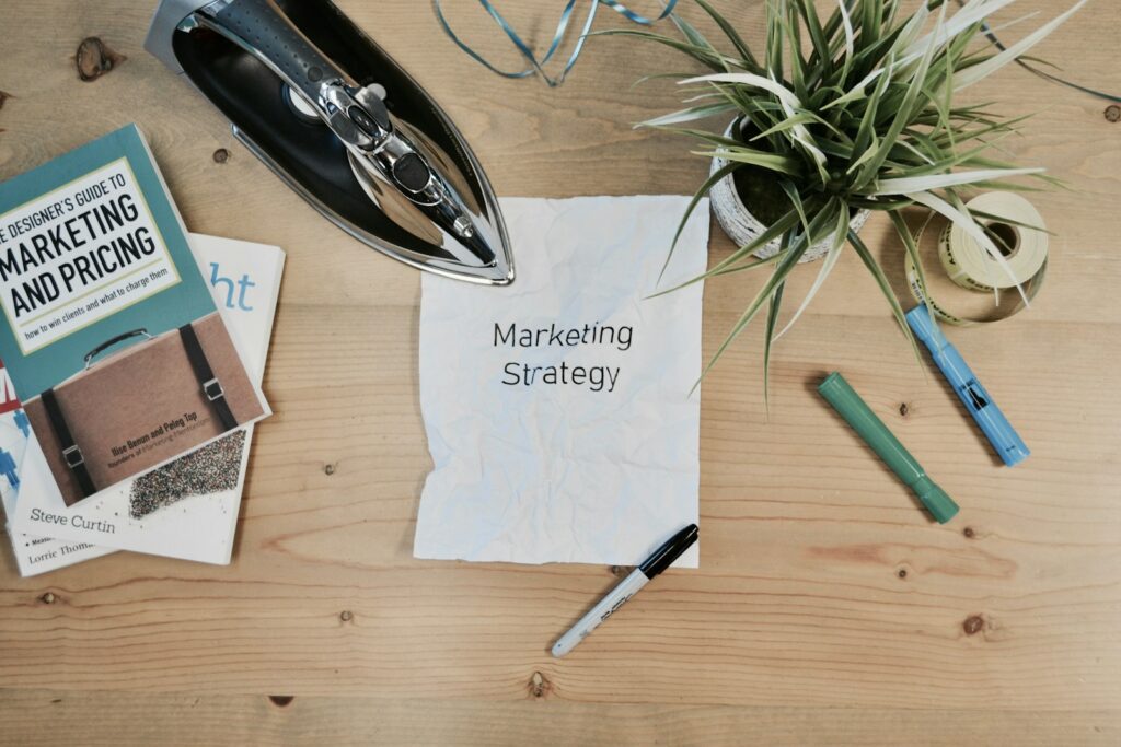 yktk2qaivhi - Now's the time white printing paper with Marketing Strategy text